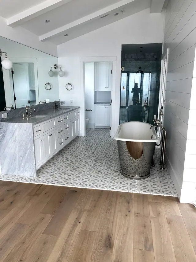Primary bathroom remodel with freestanding tub and tile shower by Grain and Stain Renovations in Hendersonville TN